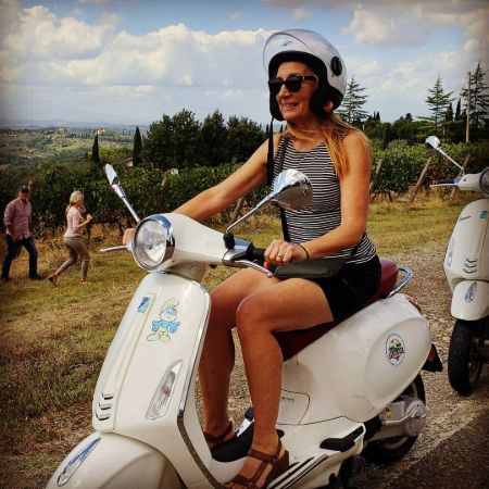 Eric Van Winkle's wife riding a scooter.